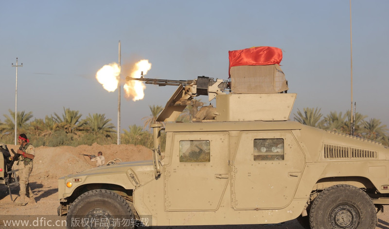 伊拉克政府军与极端组织激战 夺回一城镇控制权