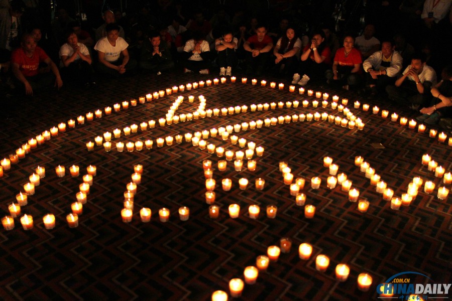 马航MH370失联客机整月 家属为亲人祈福守望