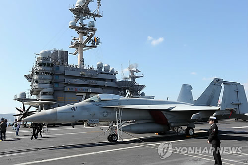 朝谴责美航母参加韩美日演习 朝军进入待命状态