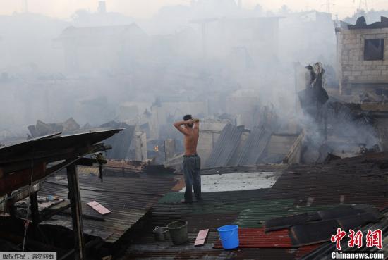 菲律宾首都居民区发生火灾 400座房屋被毁