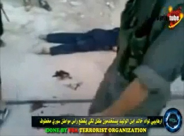 奥巴马宣布承认叙反对派 男孩斩首俘虏骇人视频流传网络
