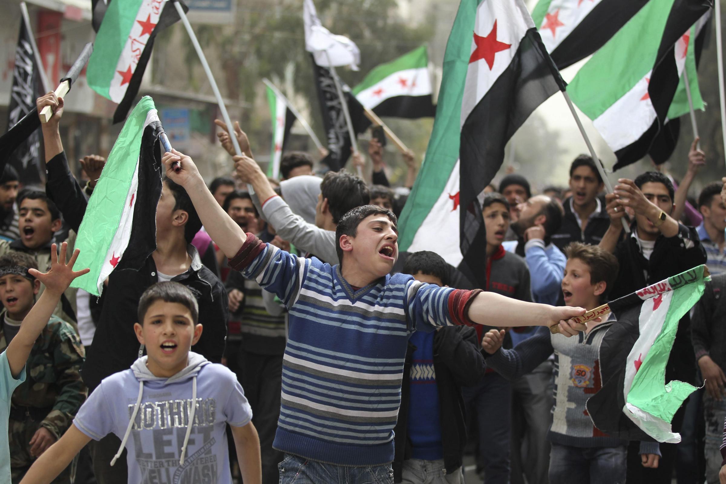 叙利亚反对派称又一政府军将领倒戈 集束炸弹再惹争议