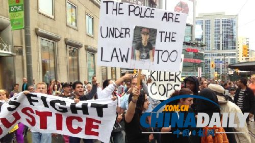 数百名加拿大人街头抗议多伦多警察乱枪射杀青年