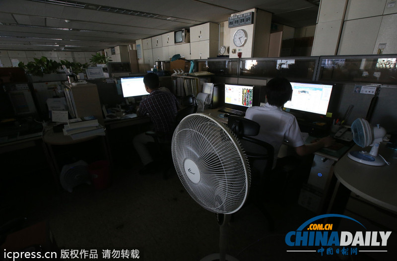 韩电力交易所关空调节电 办公室内温度高达32.6度