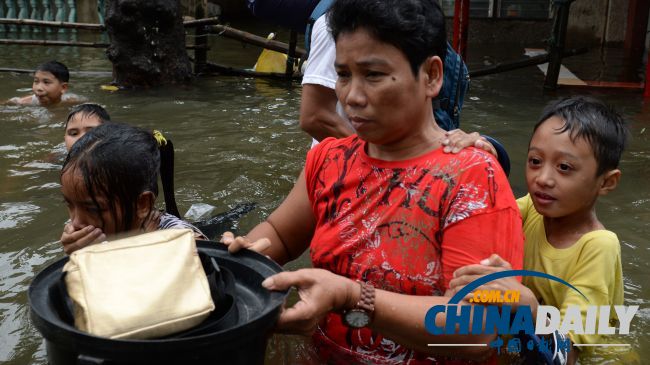 菲律宾洪灾造成至少20人死亡 60万人无家可归