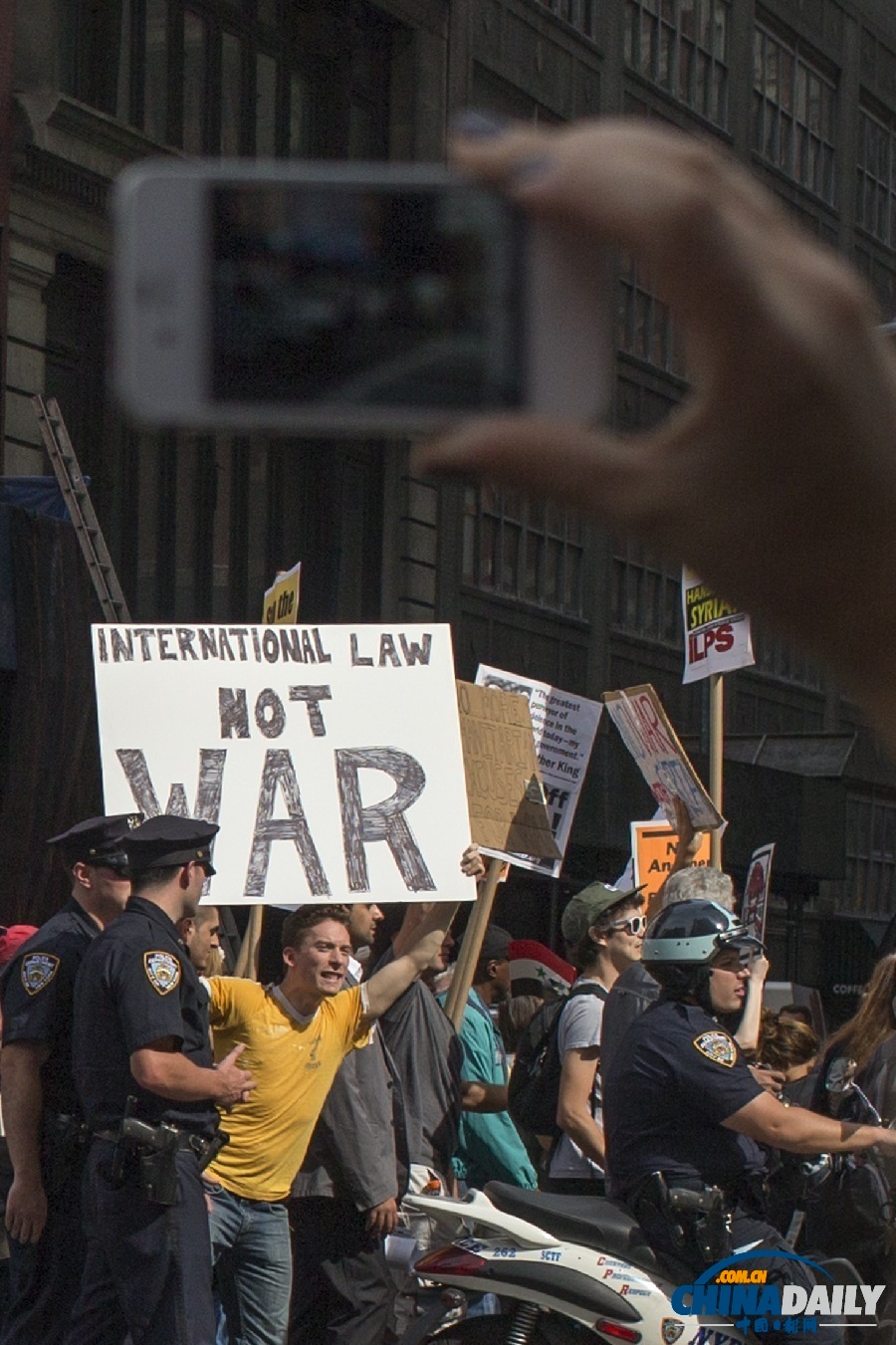 美国多地反战游行 要求国会否决军事打击叙利亚提案