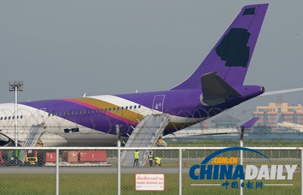泰航一飞机因故障冲出跑道 9名中国乘客受伤（高清组图）