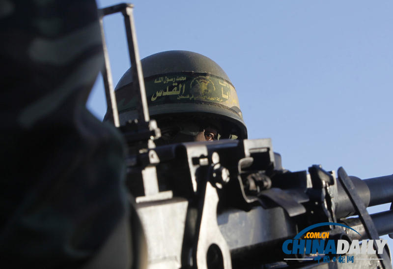 加沙伊斯兰圣战组织成员全副武装举行集会（图）
