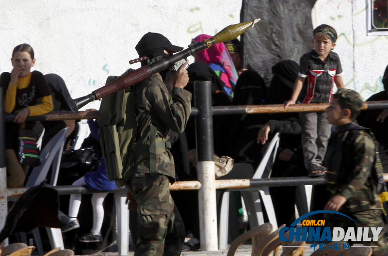 加沙伊斯兰圣战组织成员全副武装举行集会（图）