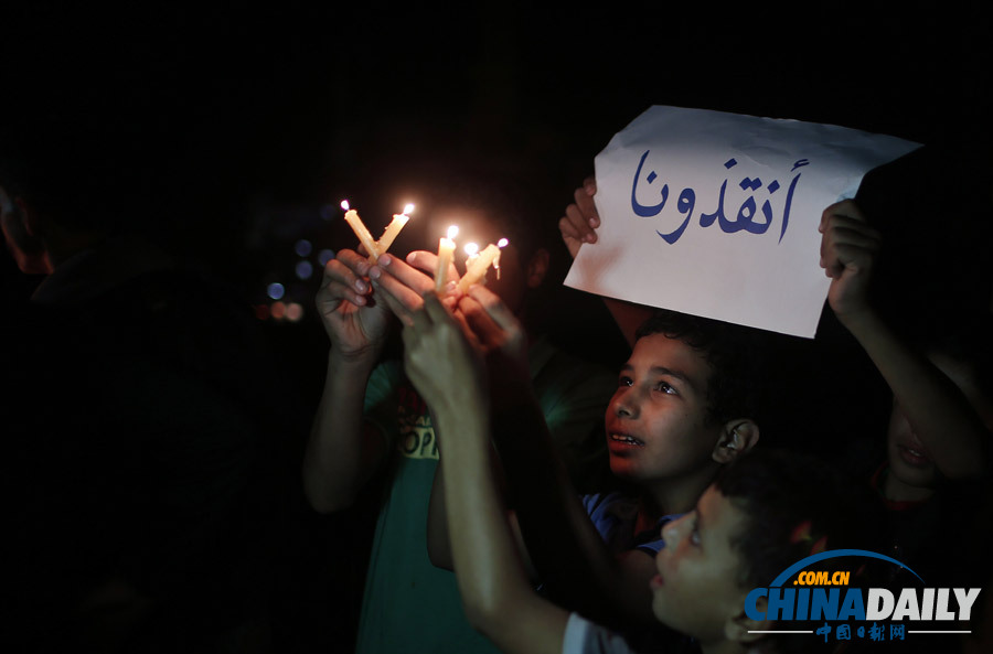 加沙唯一发电站停运 民众秉烛抗议每天停电12小时（高清组图）