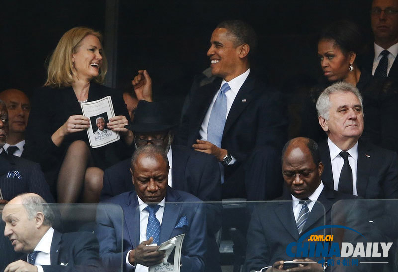 奥巴马与丹麦女首相谈笑风生 米歇尔脸色难看