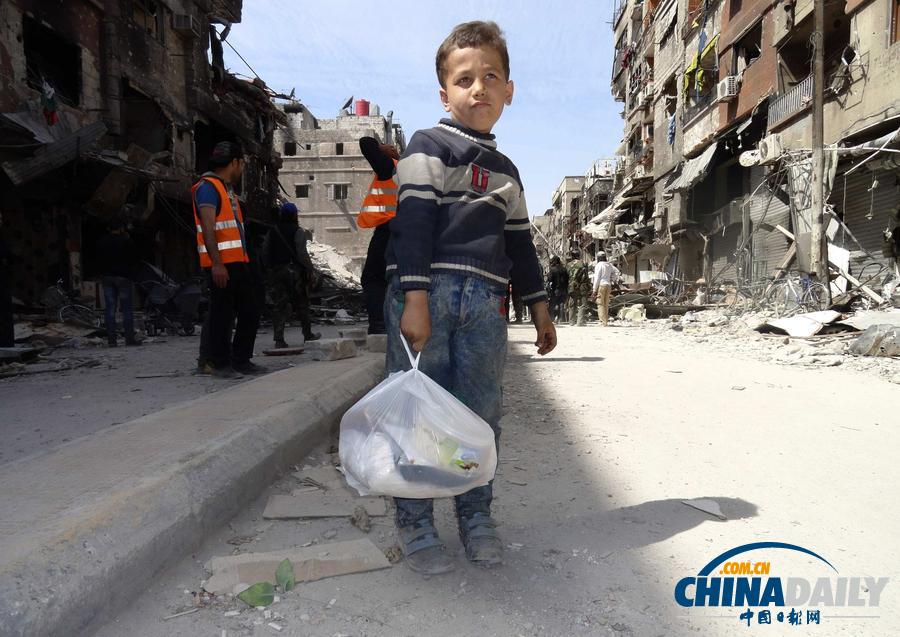 走进大马士革南部难民营 孩子们盼发救济食品