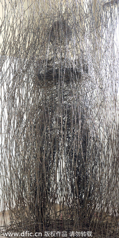 匈牙利艺术家用电缆缠绕成人像 线条匀称如真人