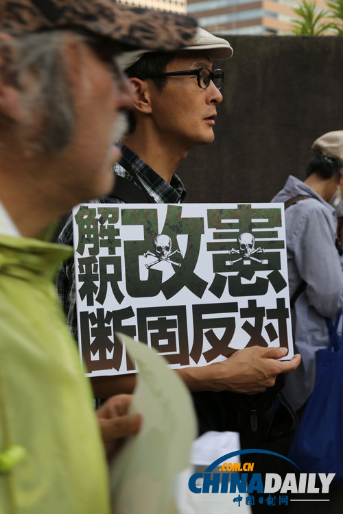 独家：日本民众抗议安倍允许行使集体自卫权（组图）