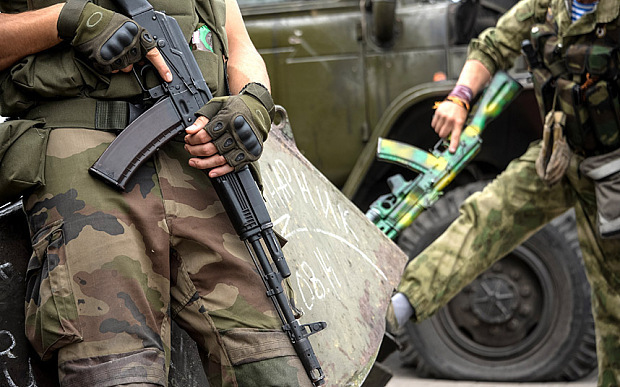俄总统普京首次公开称赞乌克兰民间武装