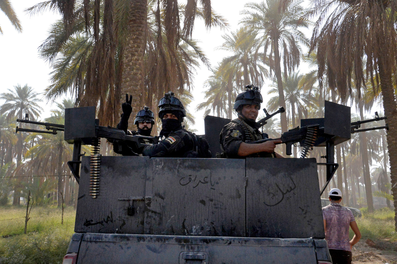 伊拉克政府军与极端组织激战 夺回一城镇控制权