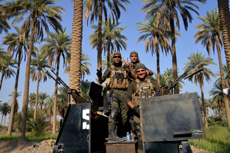 伊拉克政府军与极端组织激战 夺回一城镇控制