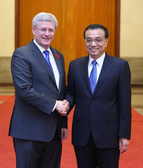 李克强同加拿大总理哈珀会谈时强调 将中加关系与合作提升到更高水平