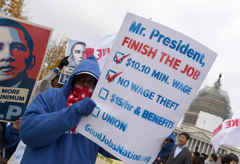 美国国会低薪合同工罢工要求涨薪
