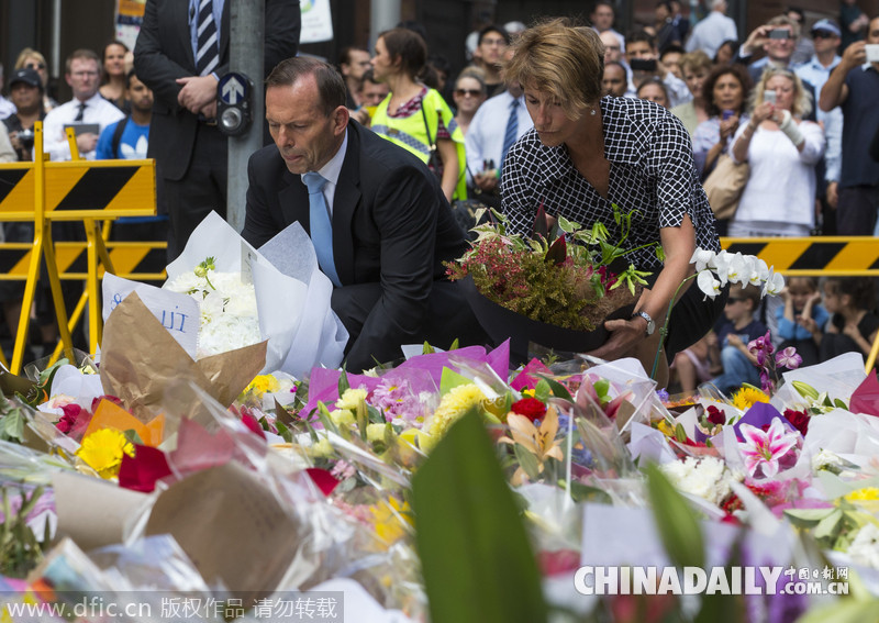 澳总理夫妇亲自献花 悼念悉尼人质劫持事件遇难者