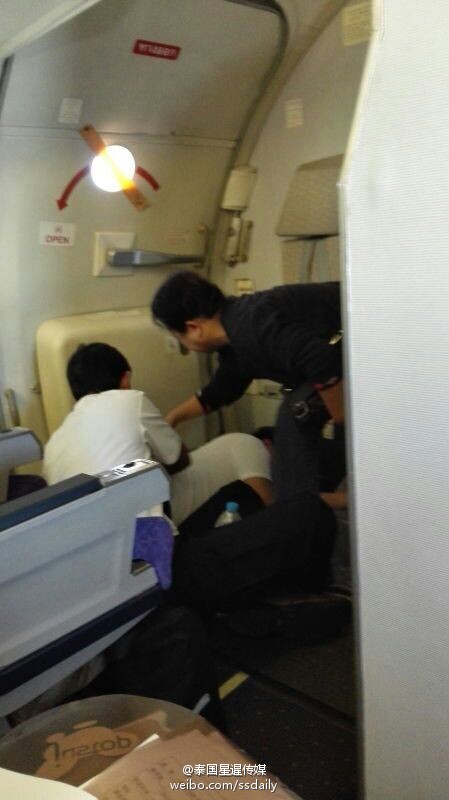 “中国大妈”飞机上勇救泰国空乘服务人员(图)