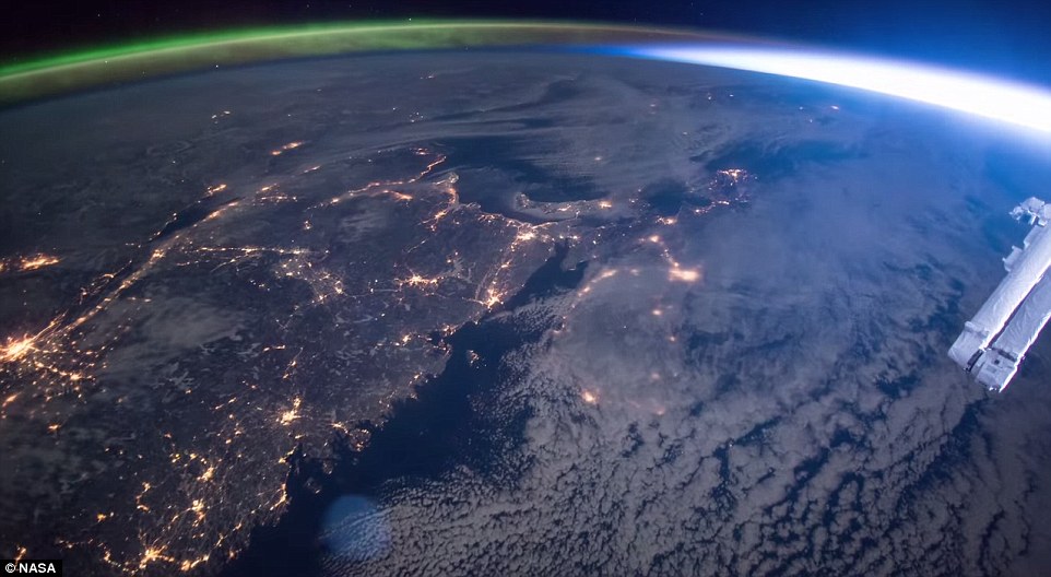 当极光遇见日出 美国宇航员拍下壮美太空奇观