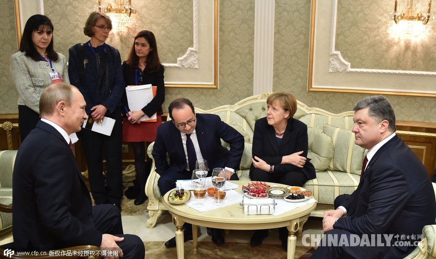 俄德法乌峰会：波罗申科与普京握手未见笑脸（组图）