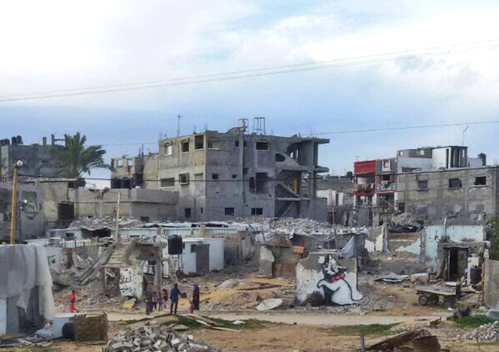 加沙废墟重现英国涂鸦艺术家班克西作品