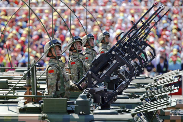侨报：阅兵显示中国捍卫和平、勇于担当