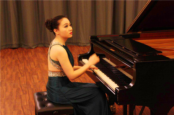 钢琴家周泉在英国成功举办中国钢琴作品专场音乐会