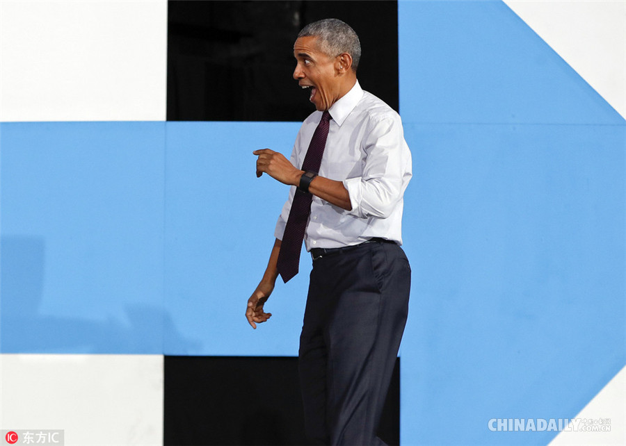 奥巴马竞选集会为希拉里卖力拉票 与儿童“扳手腕”互动