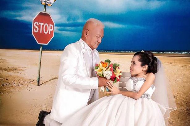 泰国女子天生长不高 与年长30岁新郎办理想婚礼(组图)