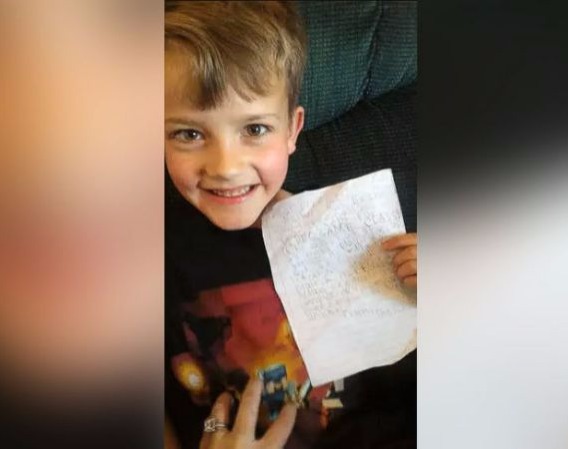 美国7岁男孩为玩电脑游戏假扮老师给父母写信