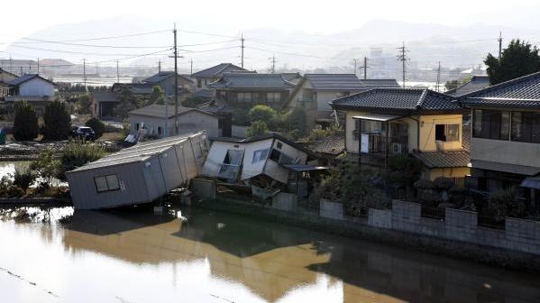 日本连日暴雨已致至少158人死亡 