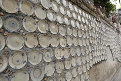 越南老农耗时20年 用近1万古董装饰自家院墙