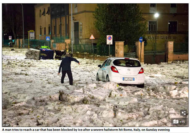 意大利遭遇罕见暴雨冰雹天气 汽车被冻在路上动弹不得