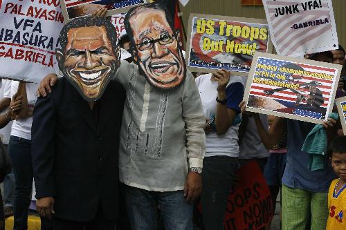 奥巴马首次在白宫会见阿基诺 菲律宾大批民众抗议