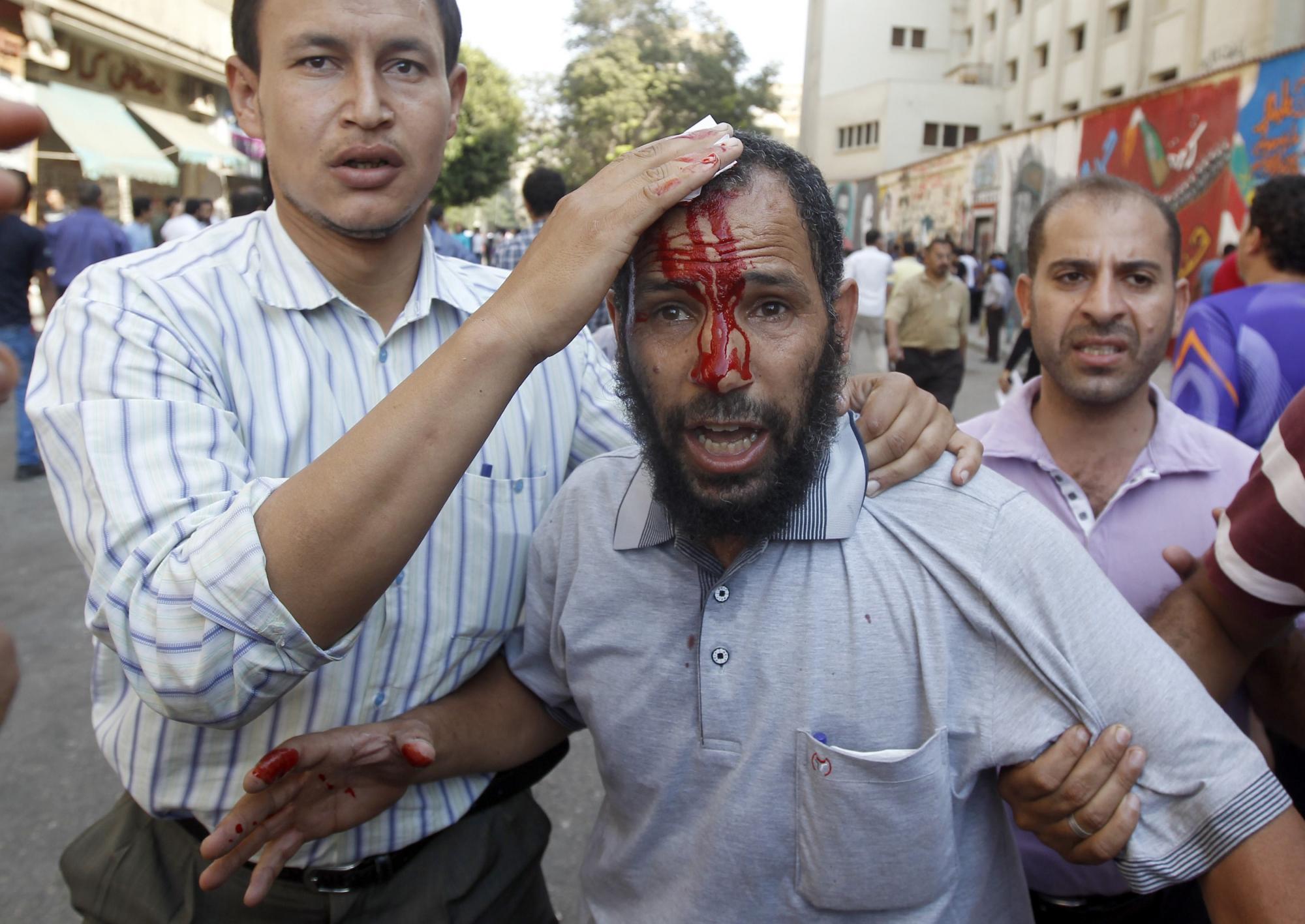 埃及爆发穆尔西总统上台后最严重冲突 至少110人受伤