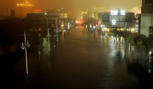 A flooded street is seen at nightfall during rains from Sandy on Monday, October 29, in Atlantic City, New Jersey. The storm made landfall over the New Jersey coast Monday evening. <a href=&apos;http://www.cnn.com/2012/10/29/us/gallery/ny-braces-sandy/index.html&apos;>View photos of New York bracing for impact.</a>