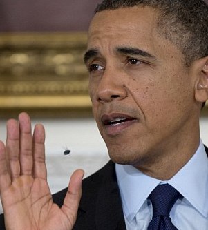 图：奥巴马白宫活动再遭苍蝇“搅局”