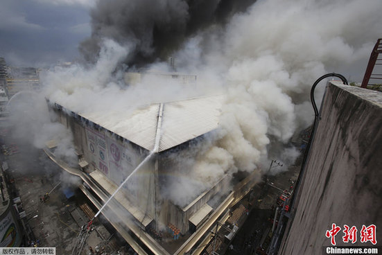 菲律宾首都购物中心发生火灾 起火原因尚未确定