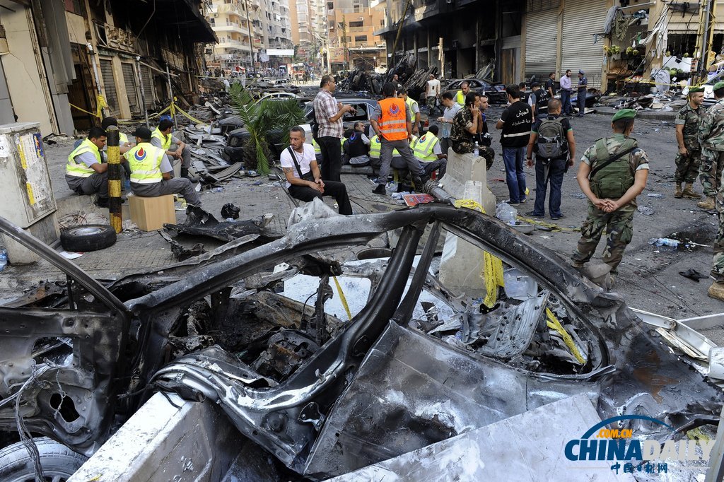 黎巴嫩政府调查爆炸现场 死伤300多人（高清组图）