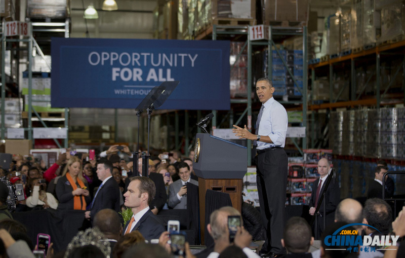 奥巴马参观超市秀亲民 承诺将提高最低工资标准