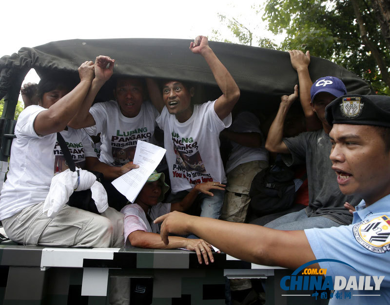 菲律宾农民潜总统府示威 要求阿基诺兑现土改承诺