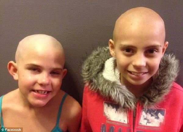 美9岁女童剃头支持患癌好友竟遭学校停课