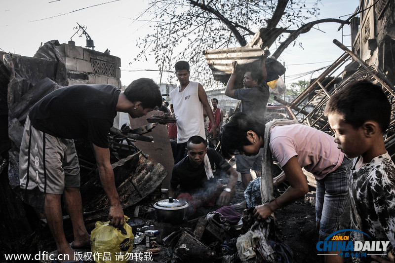 菲律宾突发大火 100多房屋被摧毁200多家庭无家可归