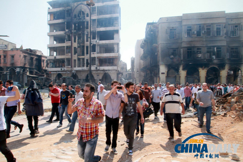 叙政府军夺回霍姆斯老城控制权 逃亡民众返回家园