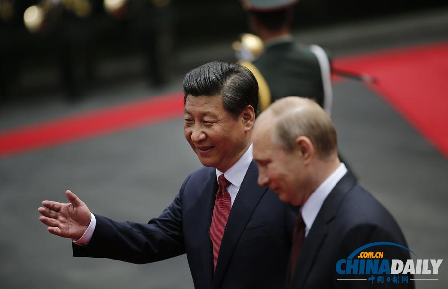 习近平为普京举行欢迎仪式 中俄元首年内第二次会晤
