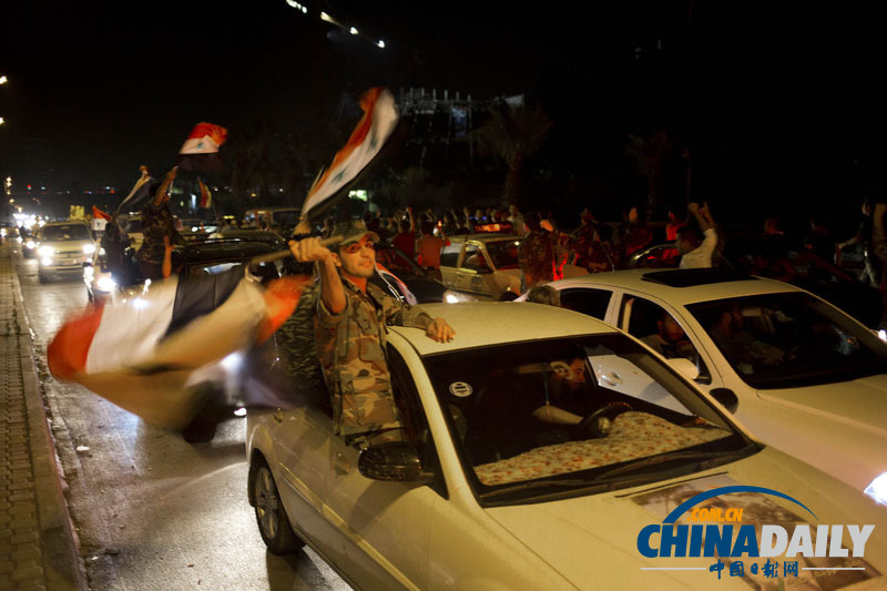 阿萨德连任叙利亚总统 士兵驾车大肆欢庆