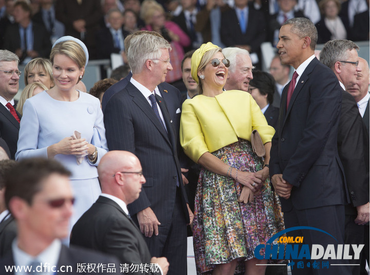 荷兰王后诺曼底走红毯险走光 与奥巴马相谈甚欢